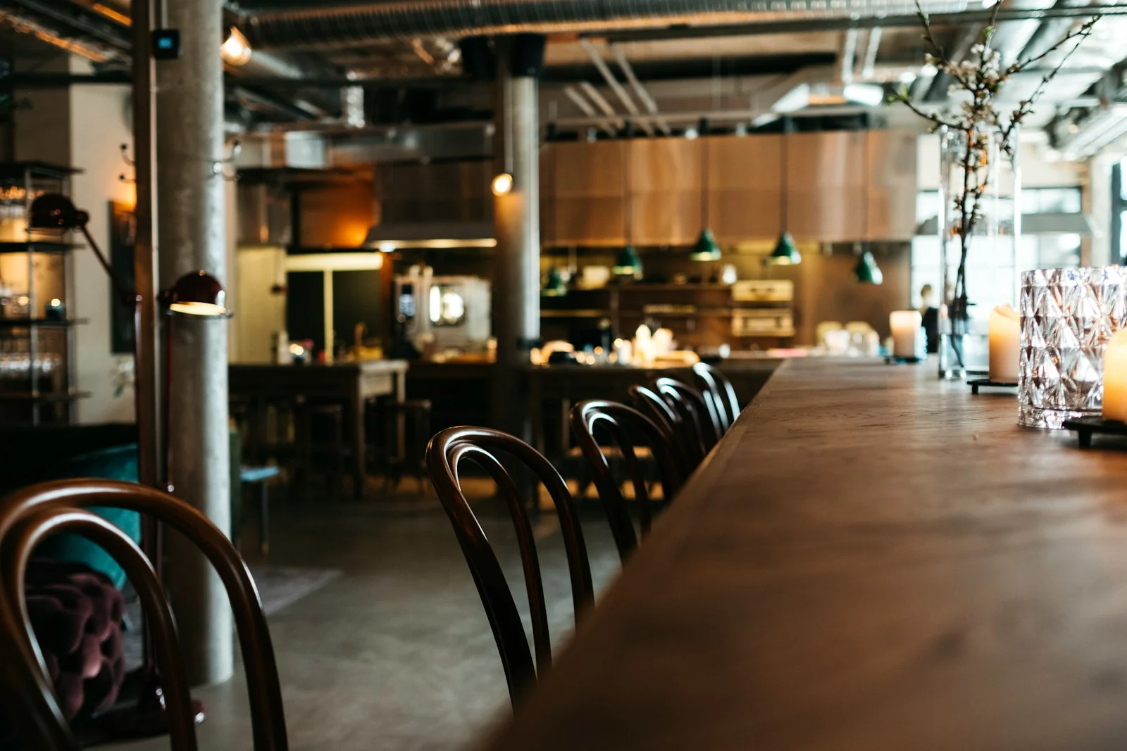 Tables set for service inside a restaurant